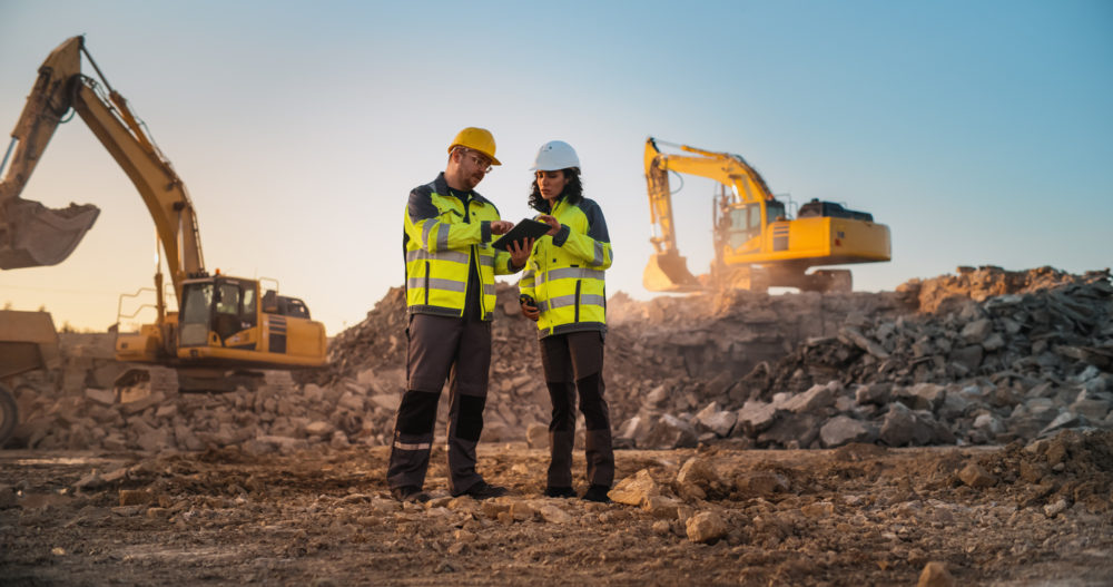 Civil Engineer Talking To Inspector