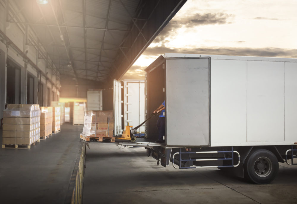 Loading pallets in a lorry ready to be loaded into a warehouse
